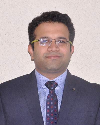 Dr. ROHIT E. NARVEKAR